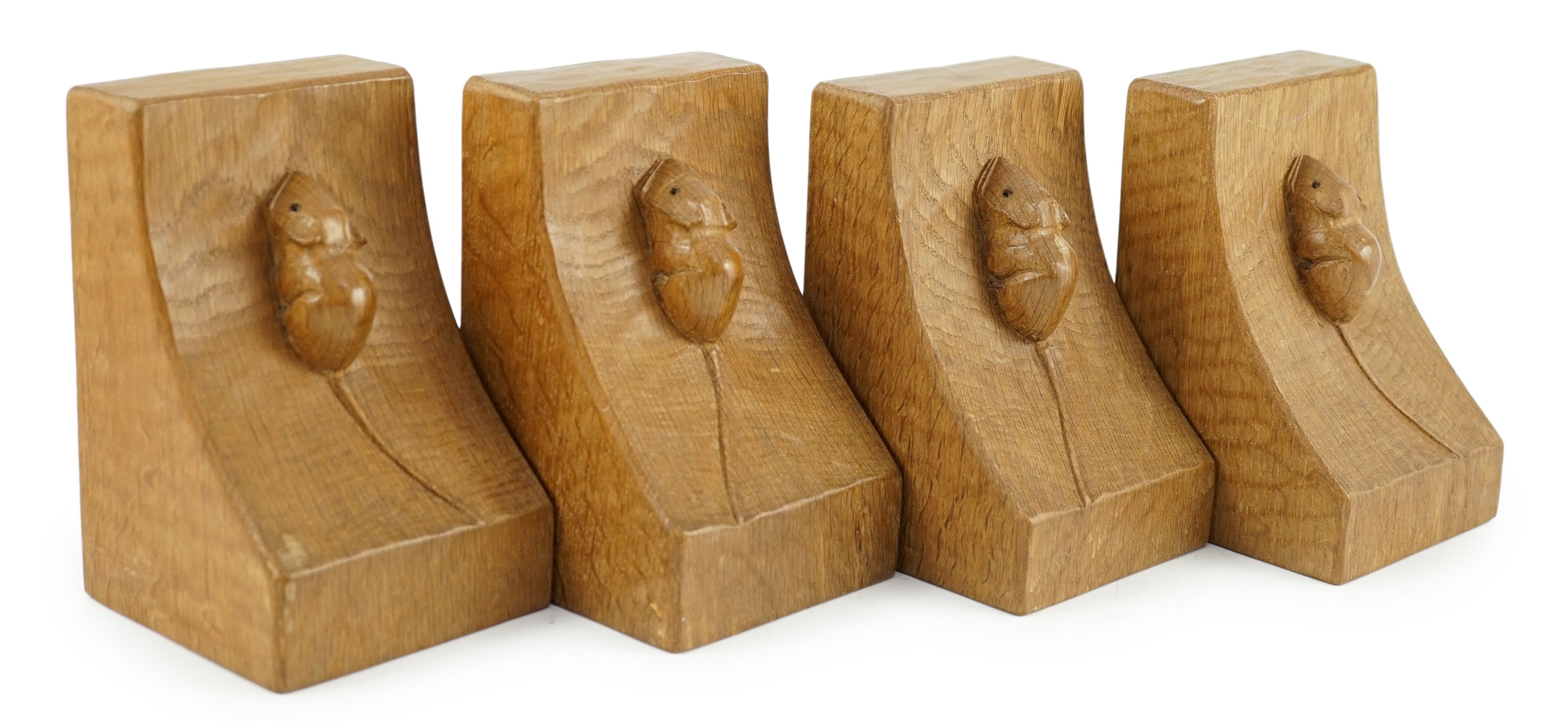 Two pairs of Robert Thompson Mouseman Thompson oak bookends, width 9.5cm depth 9.5cm height 15cm